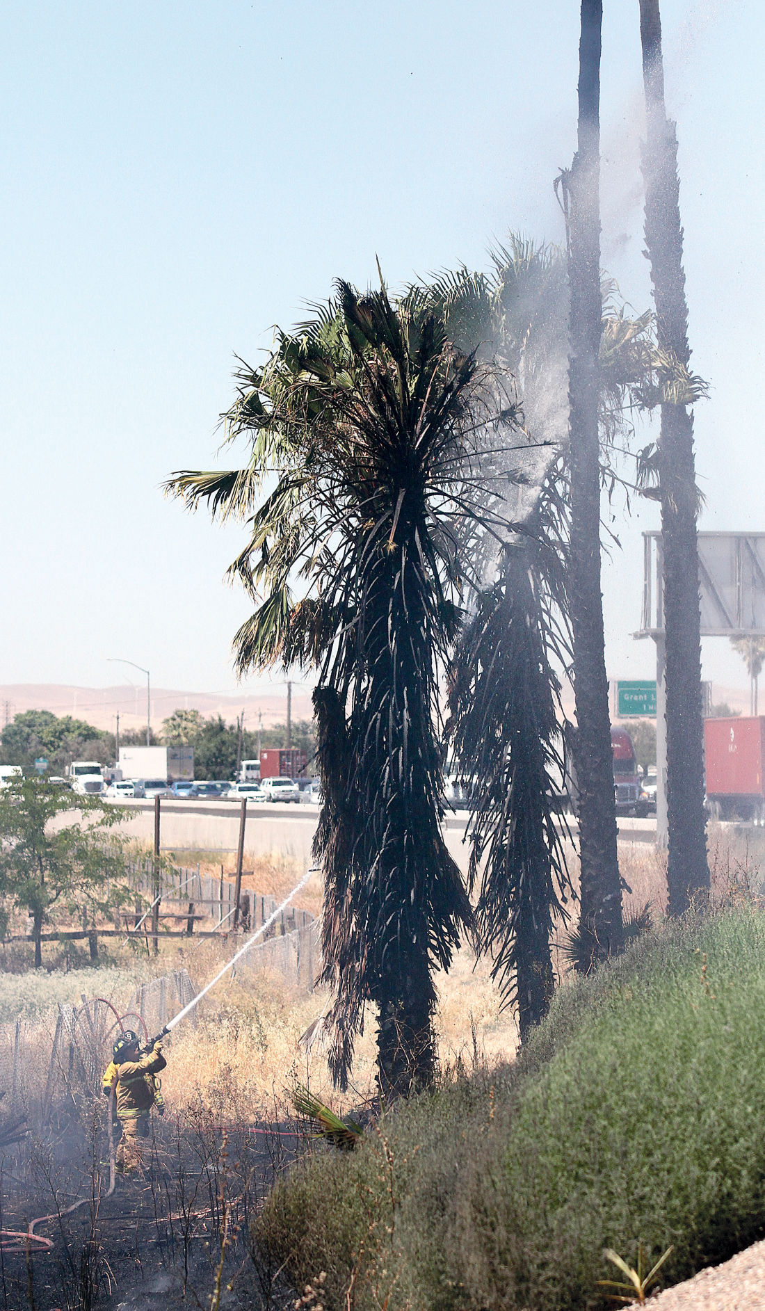 Grass fire on I-205